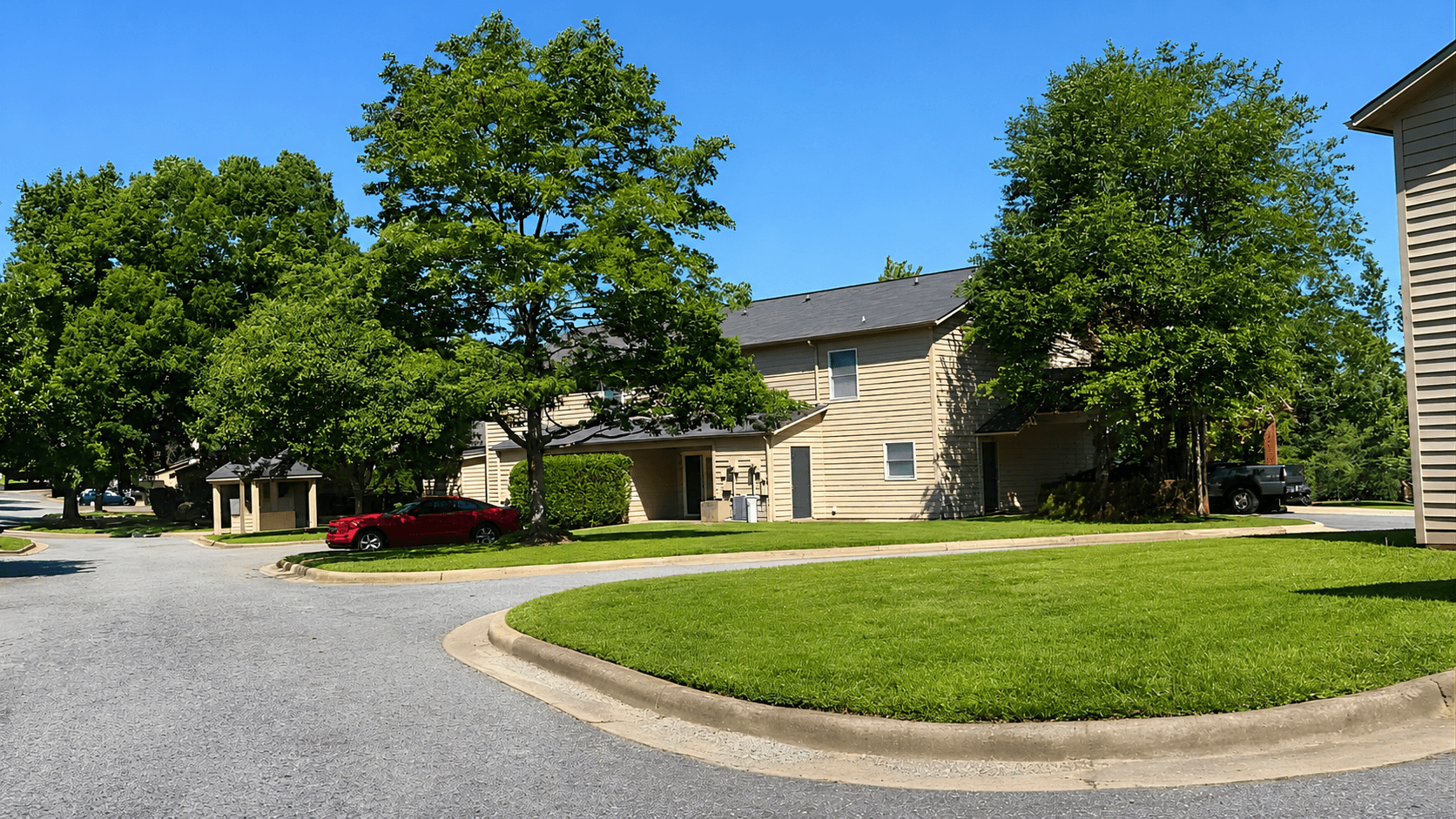 A residential area with houses and trees.
